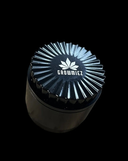 Wellenschliff Grinder schwarz mit Growmiez Logo